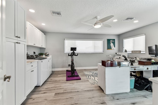 11599 Grove St, Seminole, FL 33772 - office area with washing machine and dryer, ceiling fan, a textured ceiling, light wood finished floors, and recessed lighting