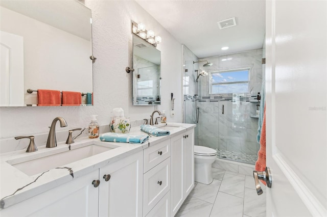 11599 Grove St, Seminole, FL 33772 - full bathroom with marble finish floors, a shower stall, and double vanity