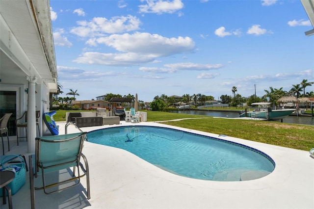 11599 Grove St, Seminole, FL 33772 - outdoor pool with a water view, a patio area, and a yard