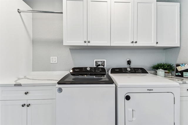 11599 Grove St, Seminole, FL 33772 - laundry room featuring washing machine and clothes dryer and cabinet space