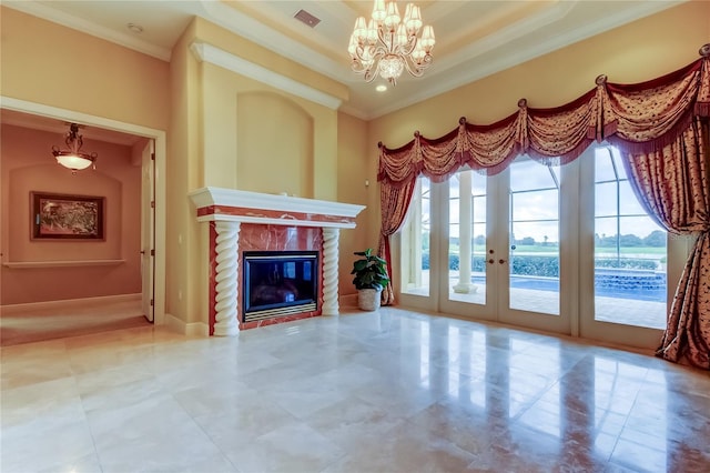 10504 Sabella Dr, Trinity, FL 34655 - unfurnished living room featuring ornamental molding, a chandelier, french doors, and a glass covered fireplace
