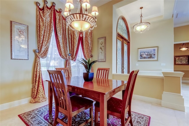 10504 Sabella Dr, Trinity, FL 34655 - dining area featuring baseboards and a chandelier