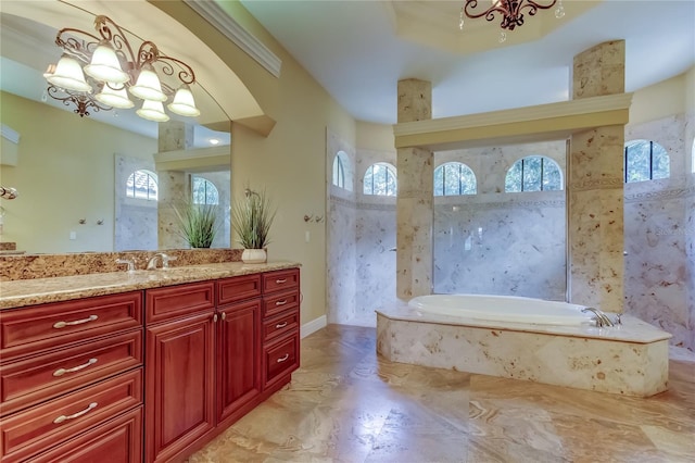 10504 Sabella Dr, Trinity, FL 34655 - bathroom featuring a chandelier, a garden tub, vanity, and healthy amount of natural light