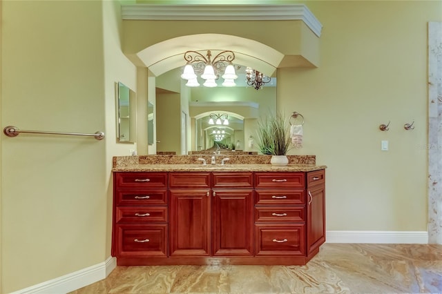 10504 Sabella Dr, Trinity, FL 34655 - bathroom featuring vanity, a chandelier, and marble finish flooring