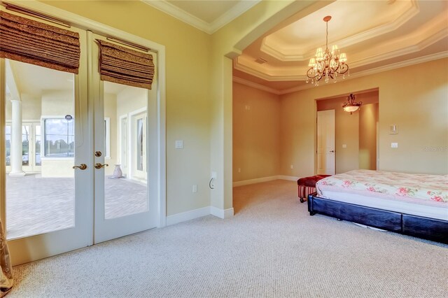 10504 Sabella Dr, Trinity, FL 34655 - carpeted bedroom with crown molding, a chandelier, a tray ceiling, french doors, and arched walkways
