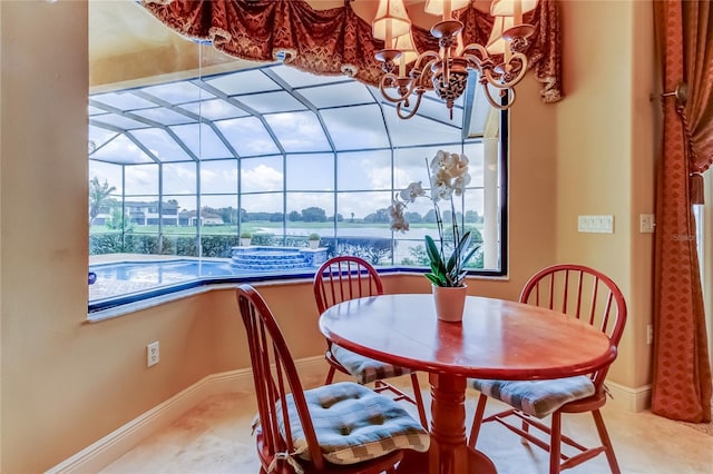 10504 Sabella Dr, Trinity, FL 34655 - dining space with a sunroom and a chandelier