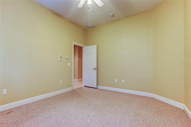 10504 Sabella Dr, Trinity, FL 34655 - unfurnished room with light colored carpet, ceiling fan, and a smoke detector