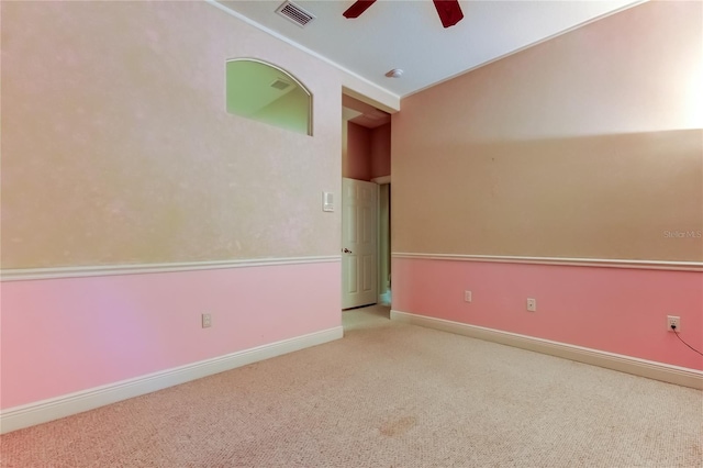 10504 Sabella Dr, Trinity, FL 34655 - empty room with a ceiling fan, carpet, and vaulted ceiling