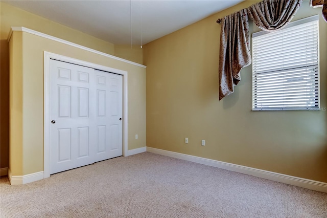 10504 Sabella Dr, Trinity, FL 34655 - unfurnished bedroom with carpet and a closet