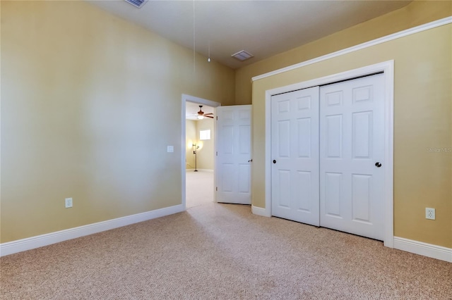 10504 Sabella Dr, Trinity, FL 34655 - unfurnished bedroom featuring carpet, a closet, and attic access