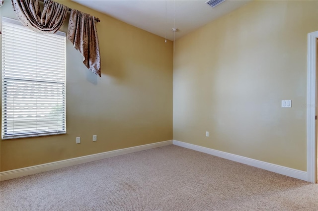 10504 Sabella Dr, Trinity, FL 34655 - carpeted spare room with baseboards