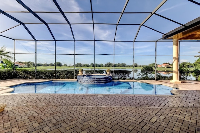 10504 Sabella Dr, Trinity, FL 34655 - view of pool featuring a pool with connected hot tub, a patio area, glass enclosure, and a water view