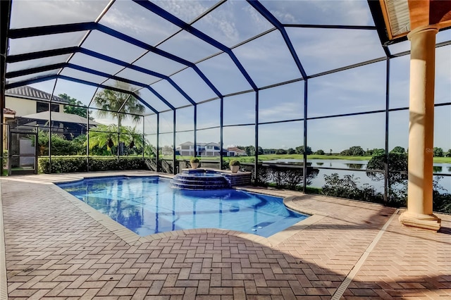 10504 Sabella Dr, Trinity, FL 34655 - view of swimming pool with a pool with connected hot tub, a patio area, a water view, and glass enclosure