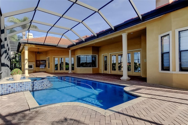 10504 Sabella Dr, Trinity, FL 34655 - view of pool featuring french doors, a patio, ceiling fan, a pool with connected hot tub, and glass enclosure
