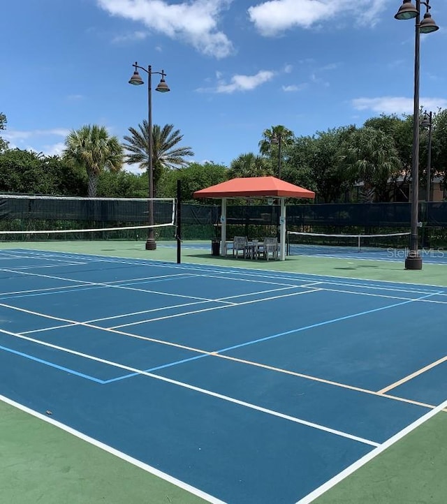 10504 Sabella Dr, Trinity, FL 34655 - view of tennis court with community basketball court