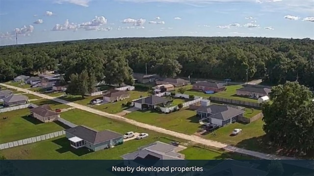4251 E Walker St, Inverness, FL 34453 - aerial view of residential area featuring a forest