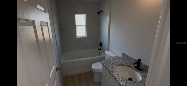4251 E Walker St, Inverness, FL 34453 - full bathroom with vanity, bathtub / shower combination, and wood finished floors