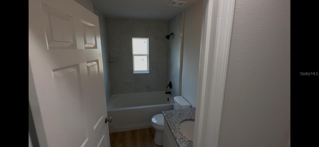 4251 E Walker St, Inverness, FL 34453 - bathroom with wood finished floors, vanity, and  shower combination