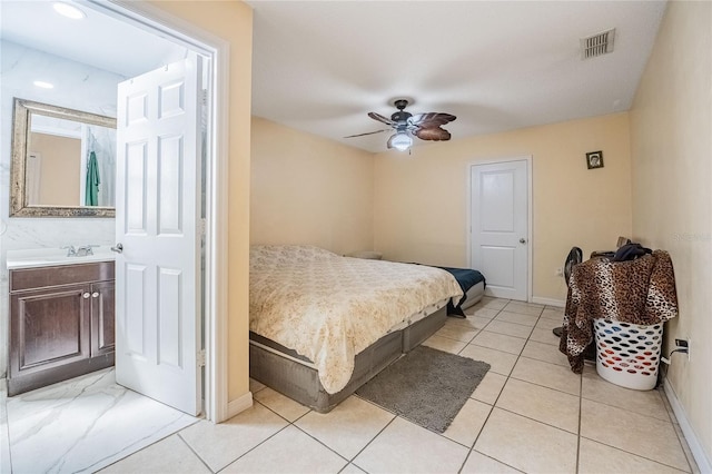 1100 Lowry Ave Unit 7, Lakeland, FL 33801 - bedroom featuring ceiling fan and ensuite bath