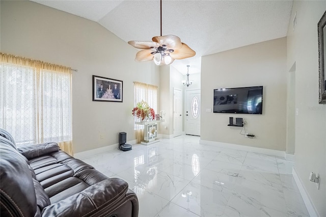 1100 Lowry Ave Unit 7, Lakeland, FL 33801 - living room featuring vaulted ceiling, marble finish floors, and ceiling fan