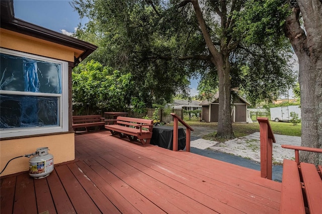 1100 Lowry Ave Unit 7, Lakeland, FL 33801 - wooden deck featuring a shed