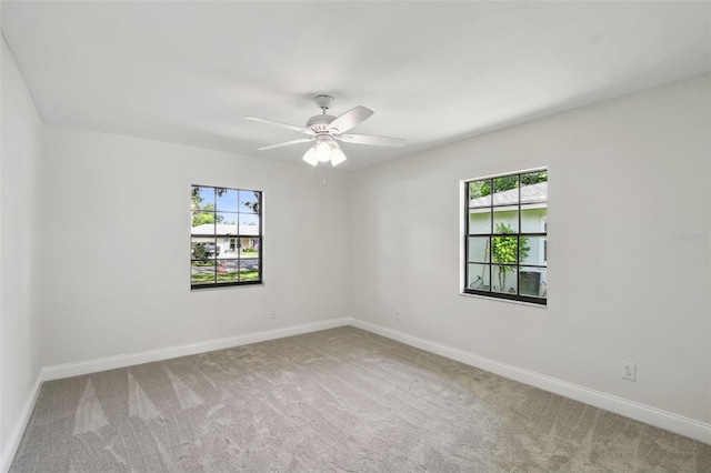 2004 Varner Cir, Winter Haven, FL 33884 - carpeted empty room featuring healthy amount of natural light and ceiling fan