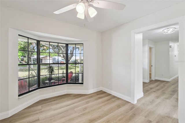 2004 Varner Cir, Winter Haven, FL 33884 - spare room with wood finished floors and a ceiling fan