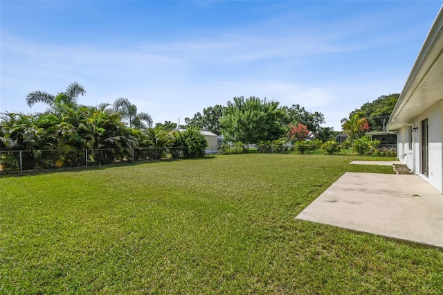 2004 Varner Cir, Winter Haven, FL 33884 - fenced backyard with a patio area
