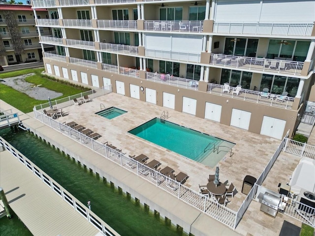 125 Island Way Unit 403, Clearwater, FL 33767 - community pool with grilling area