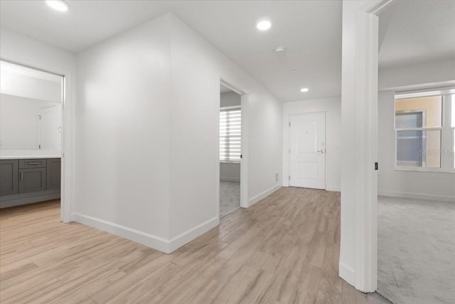 125 Island Way Unit 403, Clearwater, FL 33767 - corridor featuring light wood-type flooring and recessed lighting