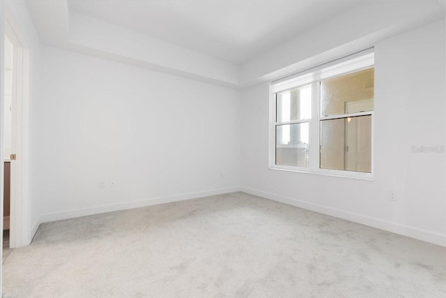 125 Island Way Unit 403, Clearwater, FL 33767 - carpeted empty room featuring baseboards
