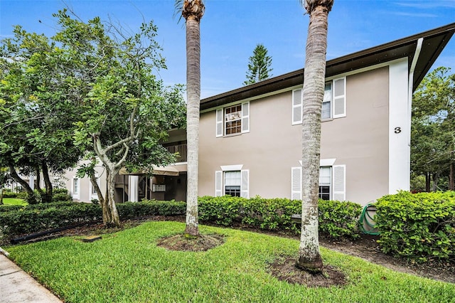 5265 E Bay Dr Unit 313, Clearwater, FL 33764 - view of home's exterior with stucco siding