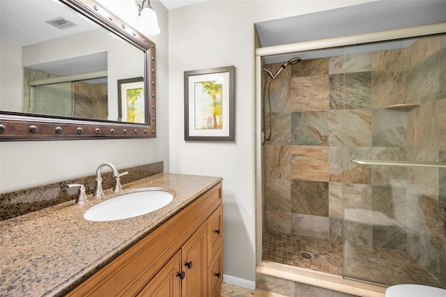 5265 E Bay Dr Unit 313, Clearwater, FL 33764 - bathroom with a stall shower and vanity