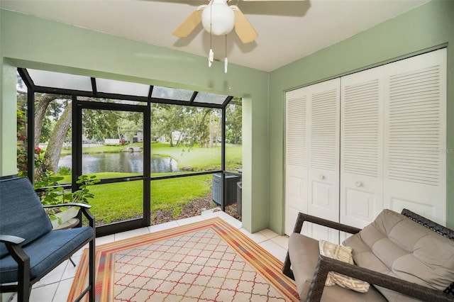 5265 E Bay Dr Unit 313, Clearwater, FL 33764 - sunroom / solarium with a water view and a ceiling fan