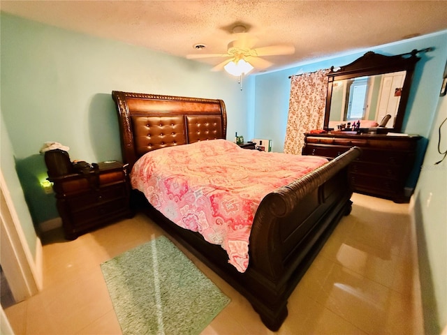 4239 Cardoon Dr, New Port Richey, FL 34653 - bedroom with a textured ceiling and a ceiling fan