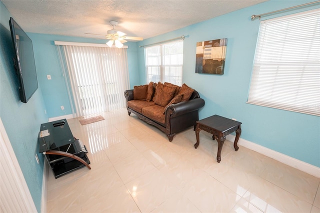 4239 Cardoon Dr, New Port Richey, FL 34653 - living room with a textured ceiling and a ceiling fan