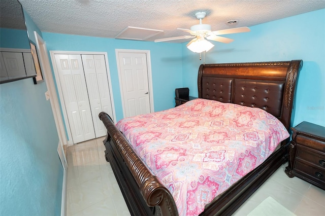 4239 Cardoon Dr, New Port Richey, FL 34653 - bedroom featuring a textured ceiling, a closet, and a ceiling fan
