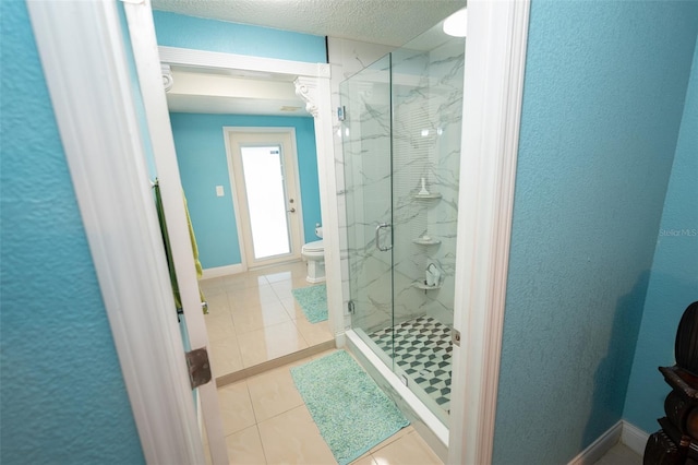 4239 Cardoon Dr, New Port Richey, FL 34653 - bathroom with a marble finish shower and tile patterned flooring