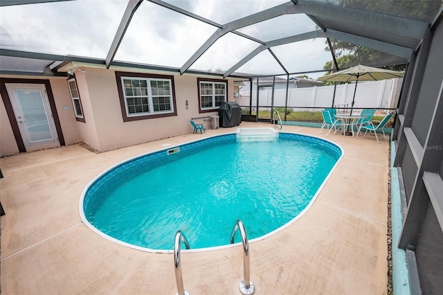 4239 Cardoon Dr, New Port Richey, FL 34653 - view of swimming pool with a patio, a lanai, and area for grilling