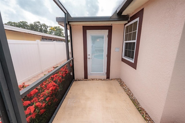 4239 Cardoon Dr, New Port Richey, FL 34653 - view of exterior entry with stucco siding