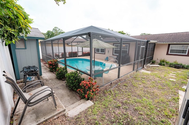 4239 Cardoon Dr, New Port Richey, FL 34653 - view of pool with a patio and a lanai