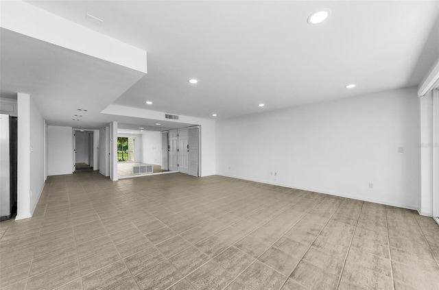 3021 Countryside Blvd Unit 28A, Clearwater, FL 33761 - unfurnished living room with recessed lighting