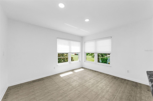 3021 Countryside Blvd Unit 28A, Clearwater, FL 33761 - empty room with recessed lighting and baseboards
