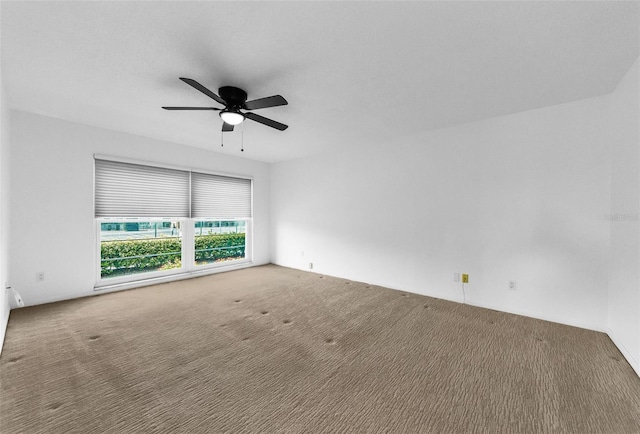 3021 Countryside Blvd Unit 28A, Clearwater, FL 33761 - carpeted empty room featuring a ceiling fan