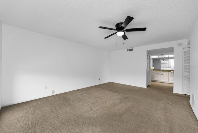 3021 Countryside Blvd Unit 28A, Clearwater, FL 33761 - empty room with carpet floors and ceiling fan