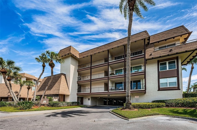 3021 Countryside Blvd Unit 28A, Clearwater, FL 33761 - view of property with driveway and a garage