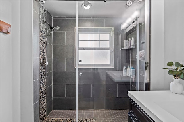 327 Sunny Ln, Belleair, FL 33756 - bathroom featuring tiled shower and vanity