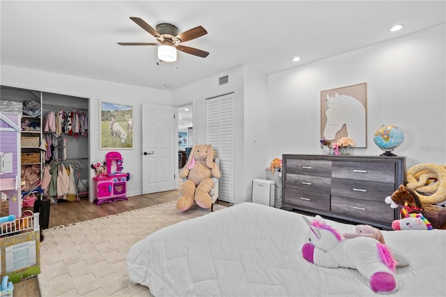 327 Sunny Ln, Belleair, FL 33756 - bedroom with wood finished floors, recessed lighting, and ceiling fan