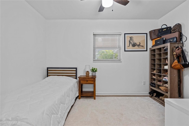 327 Sunny Ln, Belleair, FL 33756 - bedroom with ceiling fan and baseboards
