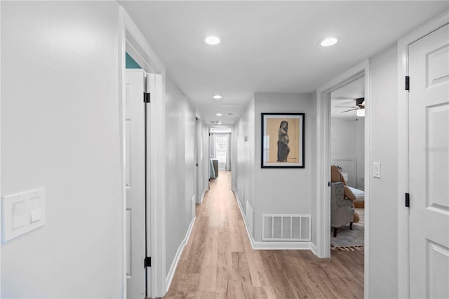 327 Sunny Ln, Belleair, FL 33756 - hallway featuring light wood-type flooring and recessed lighting